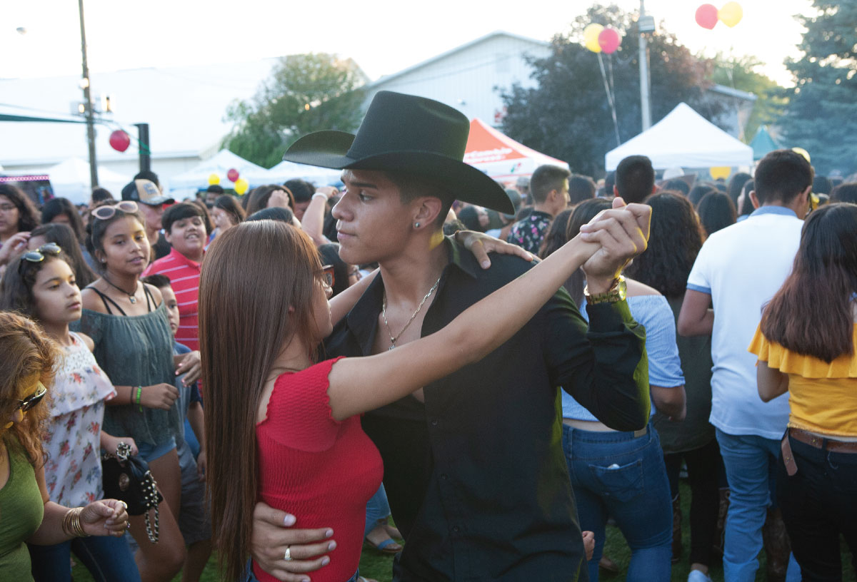 Dancing at Noche Latina, Elkhart County Fair, Elkhart, IN. Photo by Kay Westhues
